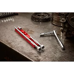 Image of the Milwaukee 4pc 3/8” Drive Extension Set on an autoshop table